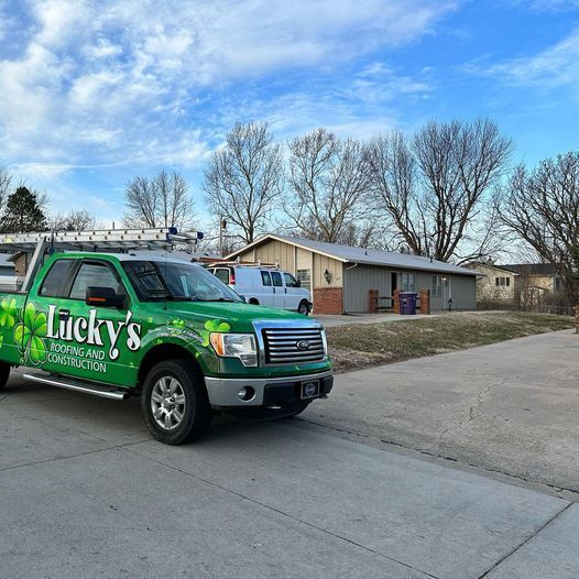 Lucky's Roofing and Construction service truck