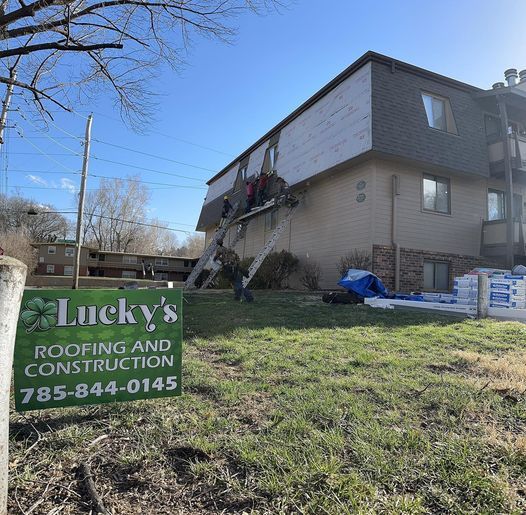 men at work roofing service