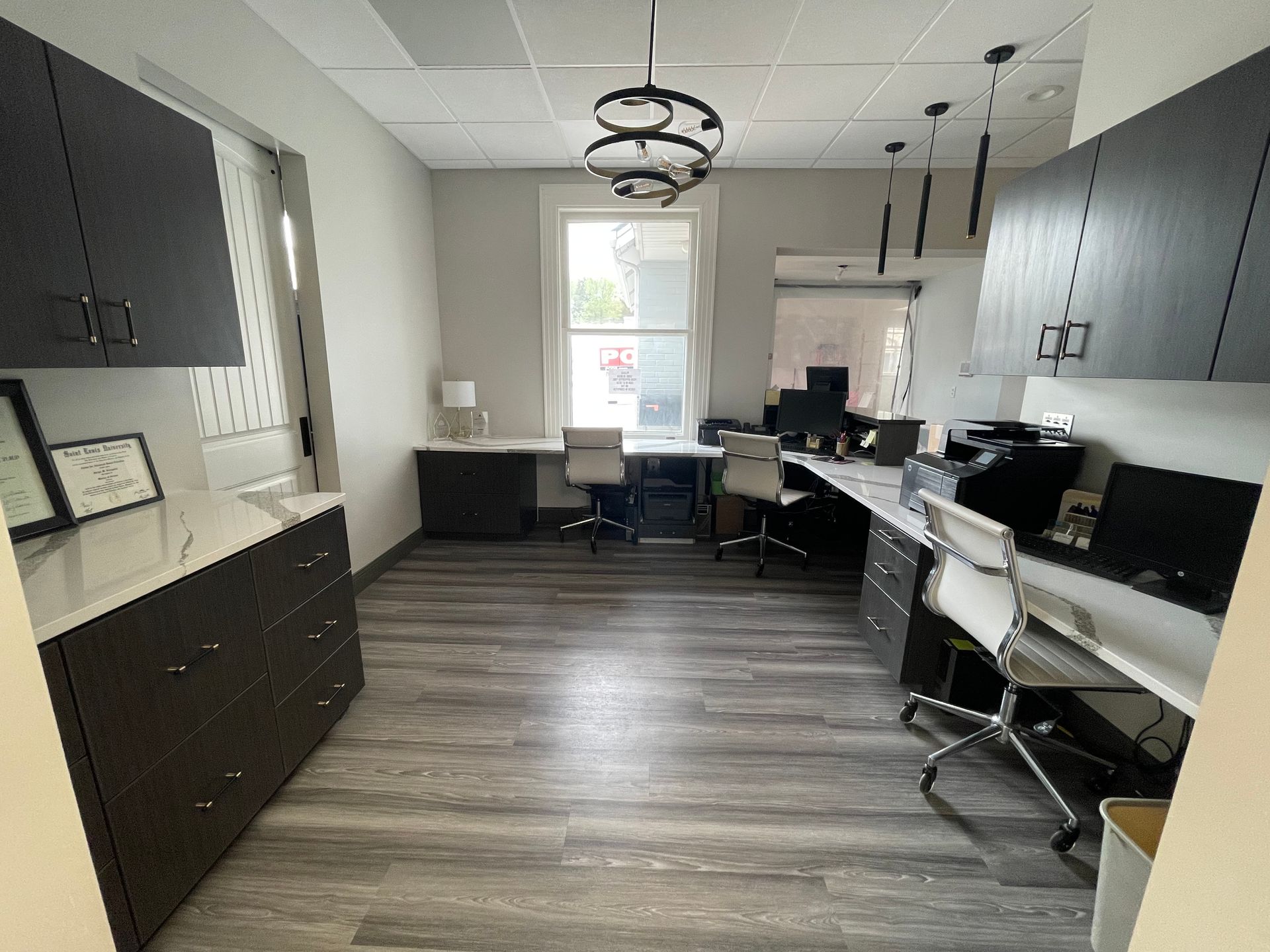 Junction Orthodontics office with computers and printer