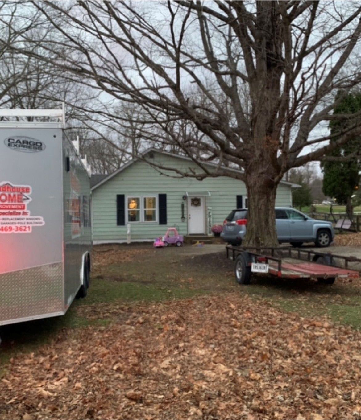 Woodhouse and a gray car
