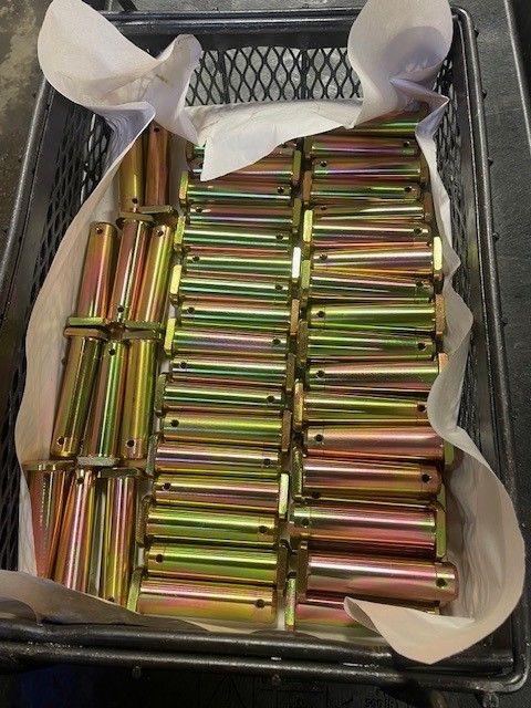 Tray filled with metal cartridges wrapped in tissue paper