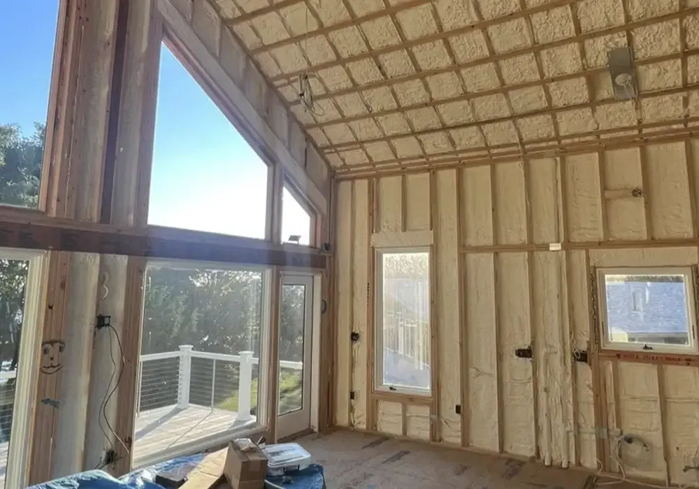A room with a lot of windows and foam on the walls.