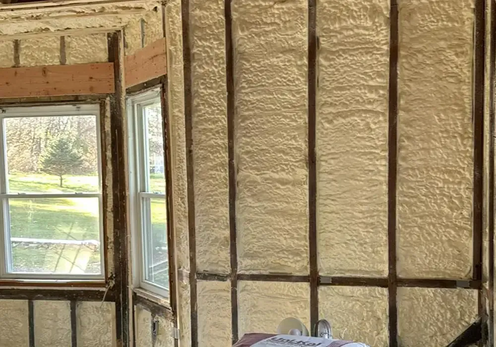 A room with a lot of foam on the walls and a window.