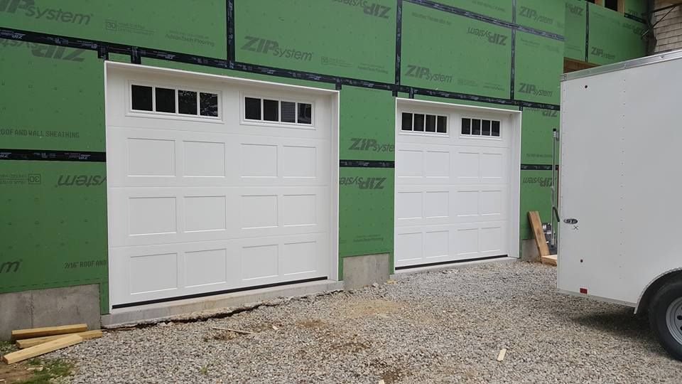 Two white garage doors