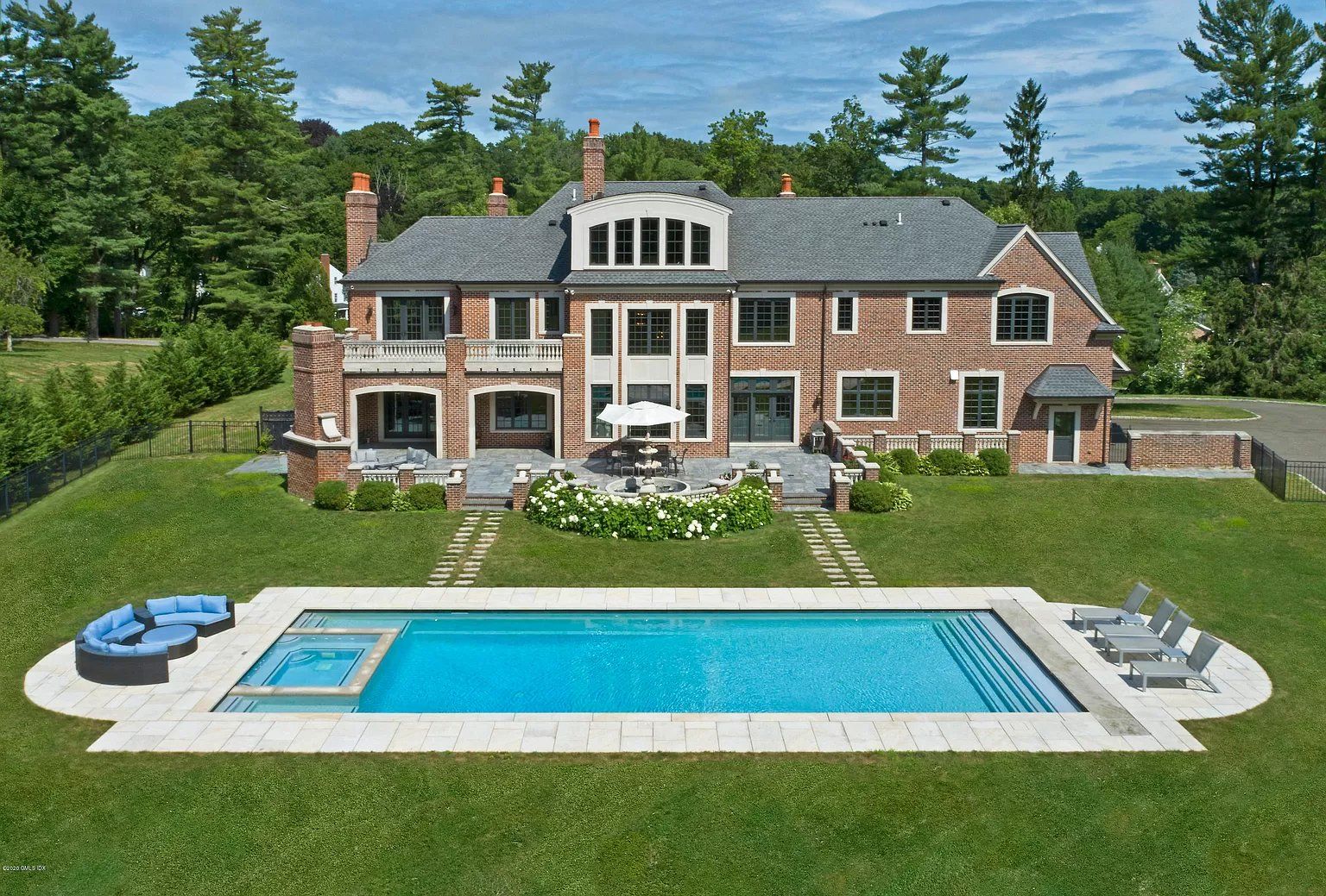 Brick mansion with pool