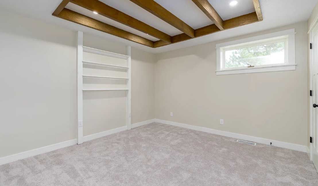 There is a window in the corner of the room.