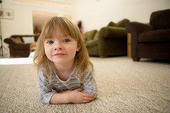 Child on the carpet floor at home