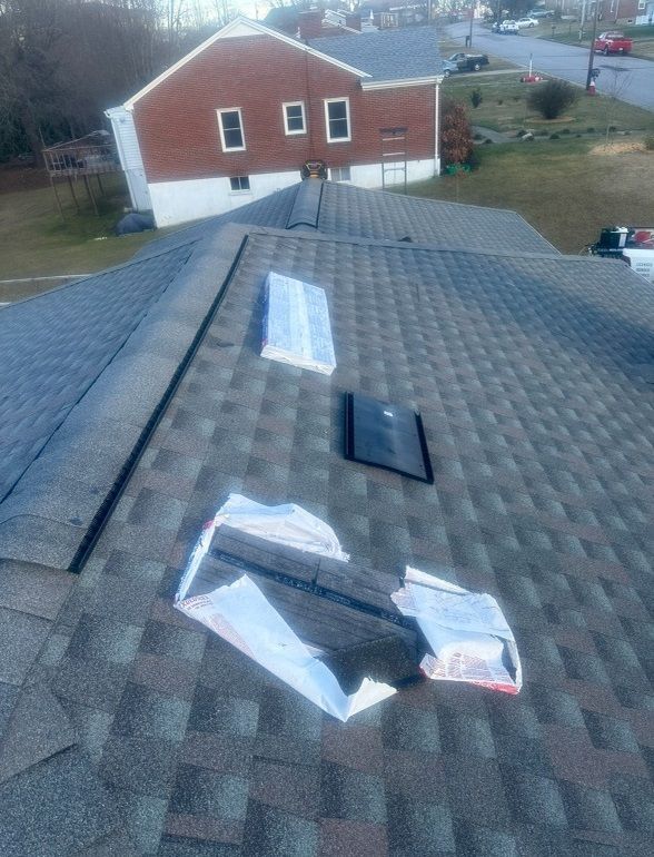 a roof with a few skylights on it