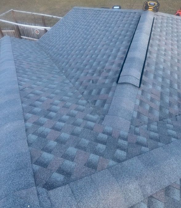 a close up of a roof with shingles on it