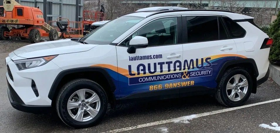 Security logo on a white car