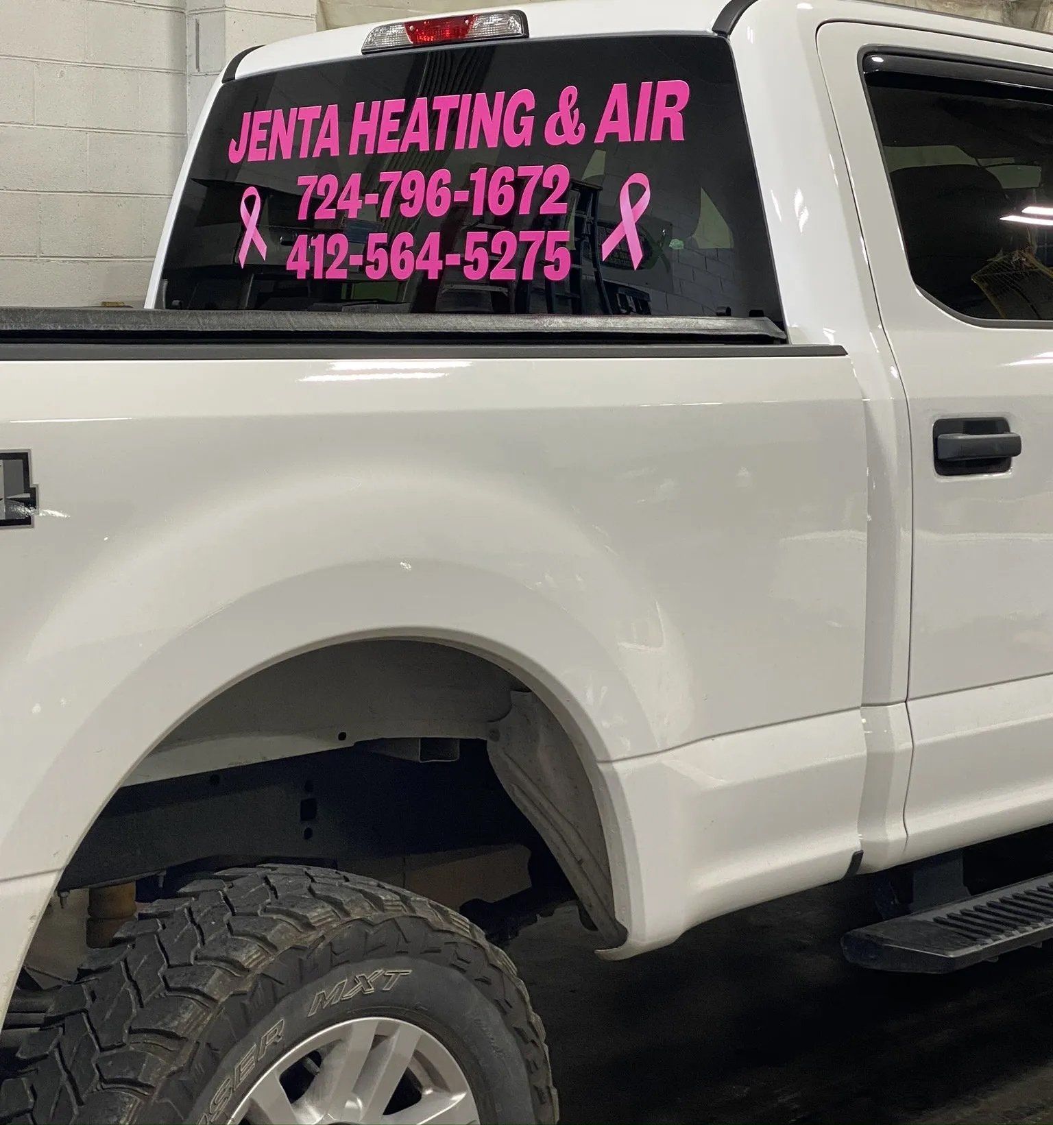 Vinyl sticker logo on truck glass