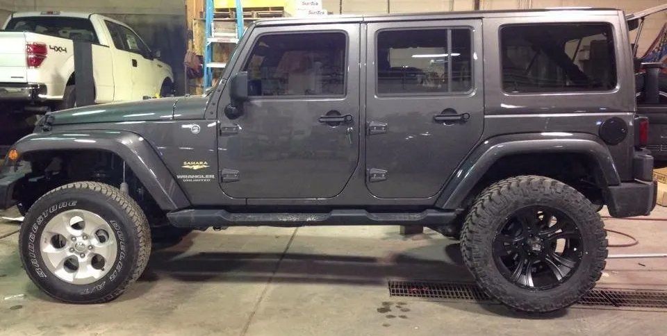 Side view of a black Jeep
