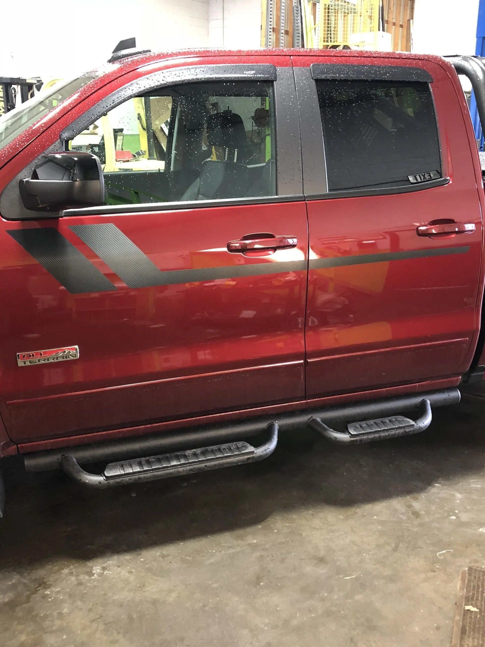 Vinyl graphic on a red pick up truck