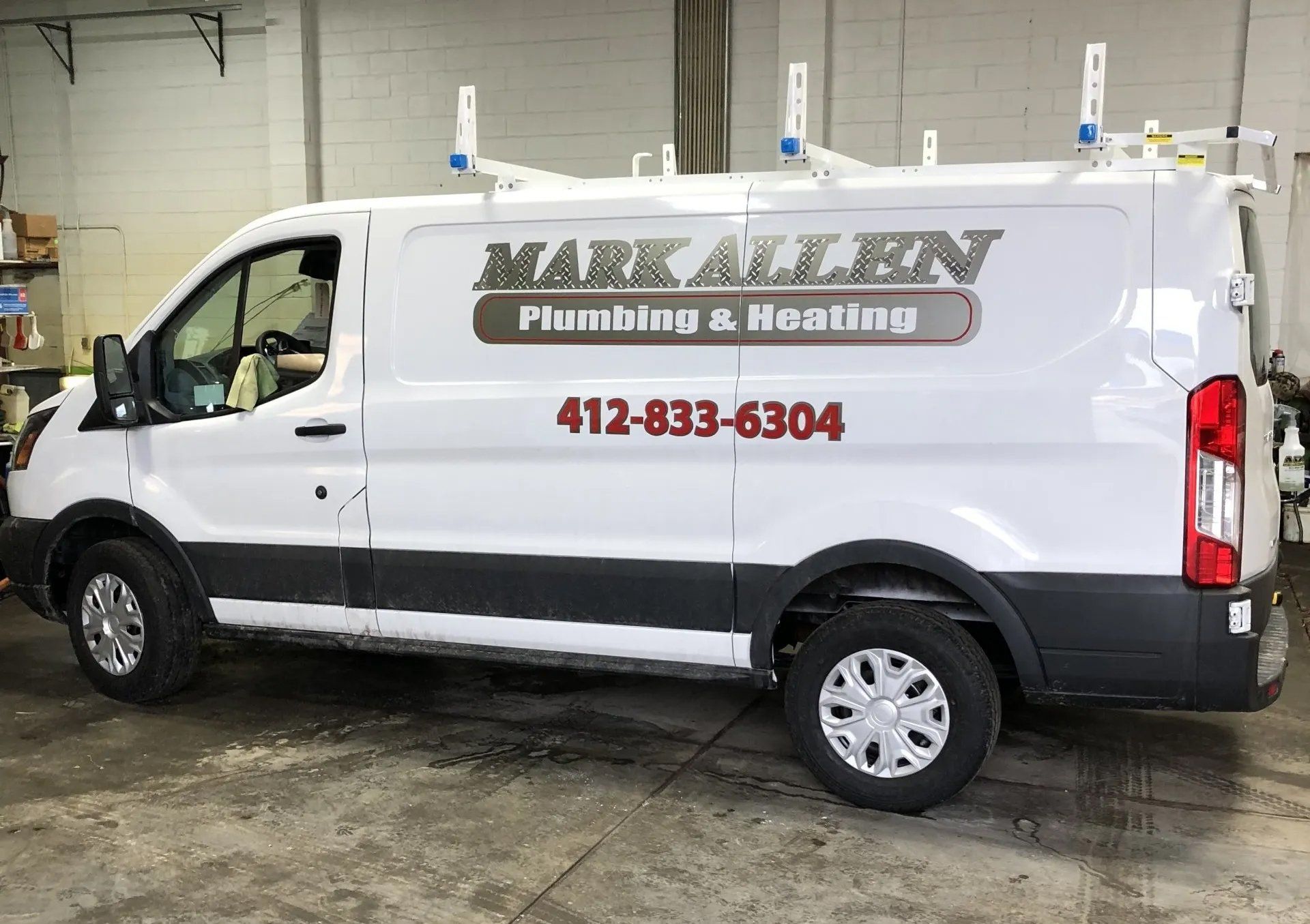 Business van with graphic logo