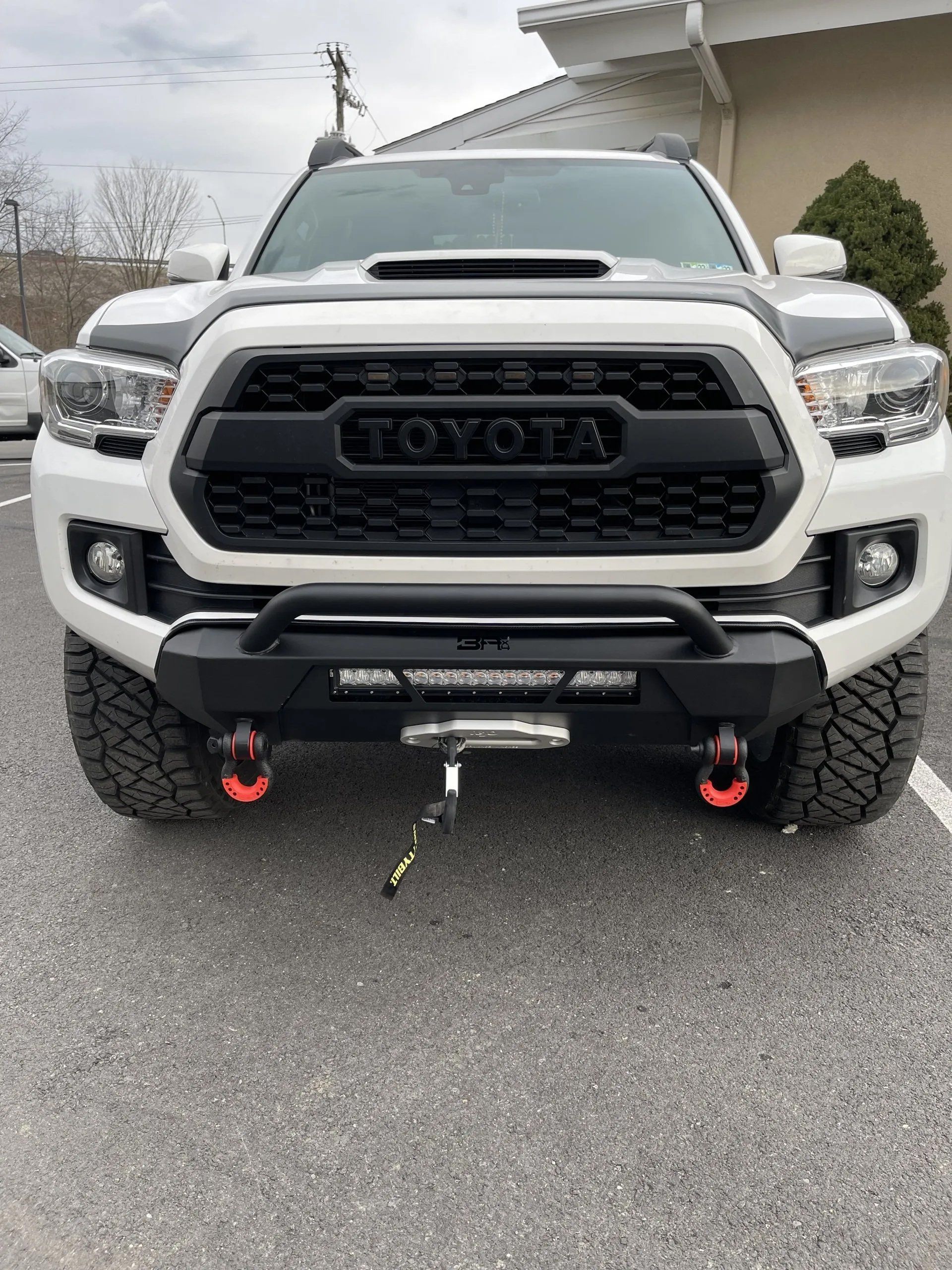 Modified bumper of white truck
