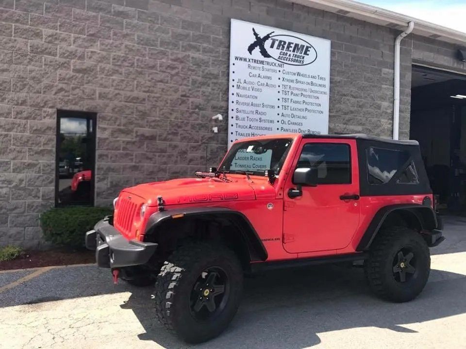 Modified red Jeep