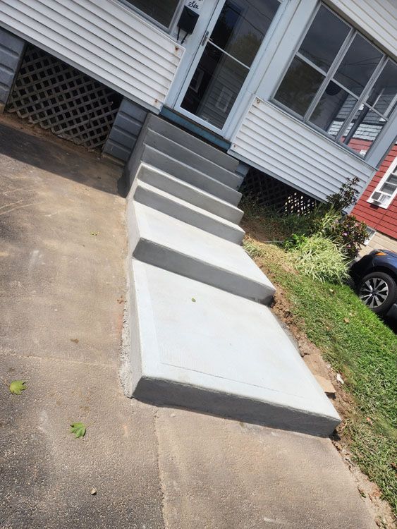 Concrete steps leading up to a house