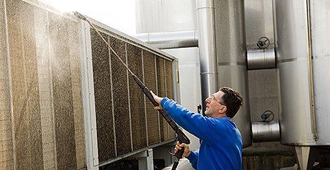 Air conditioning coil cleaning