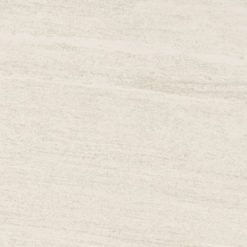 A close up of a white tile with a grainy texture.