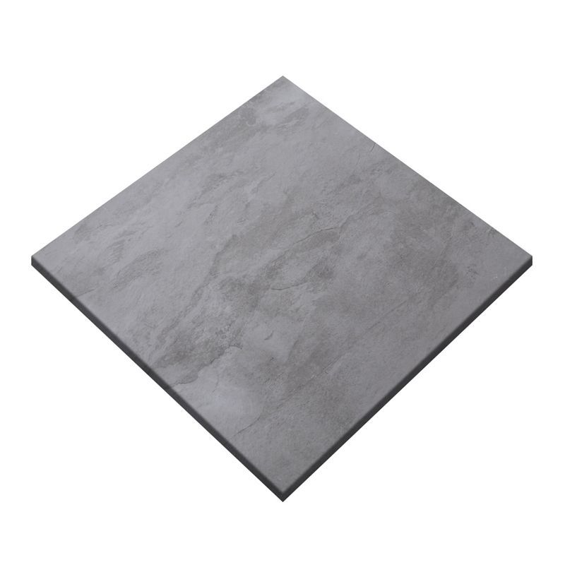 A square gray tile with a white background