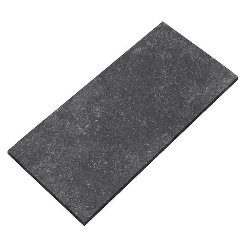 A black tile is laying on a white surface