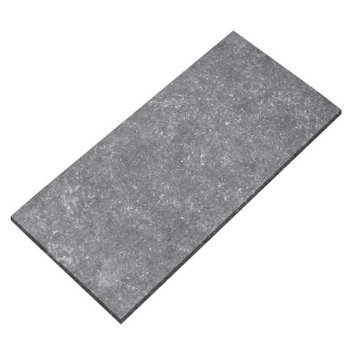 A gray tile is laying on a white surface