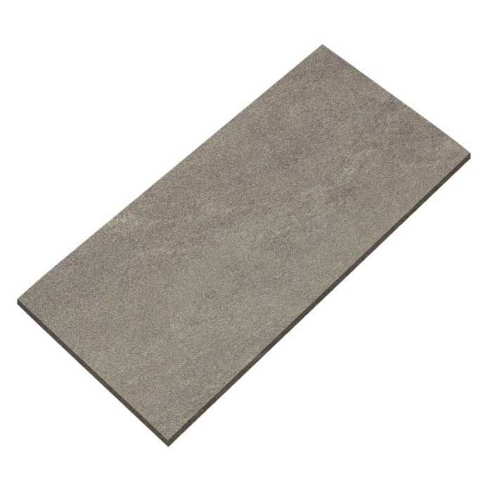 A gray tile is laying on a white surface