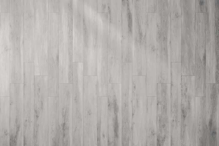 A close up of a white wooden floor.