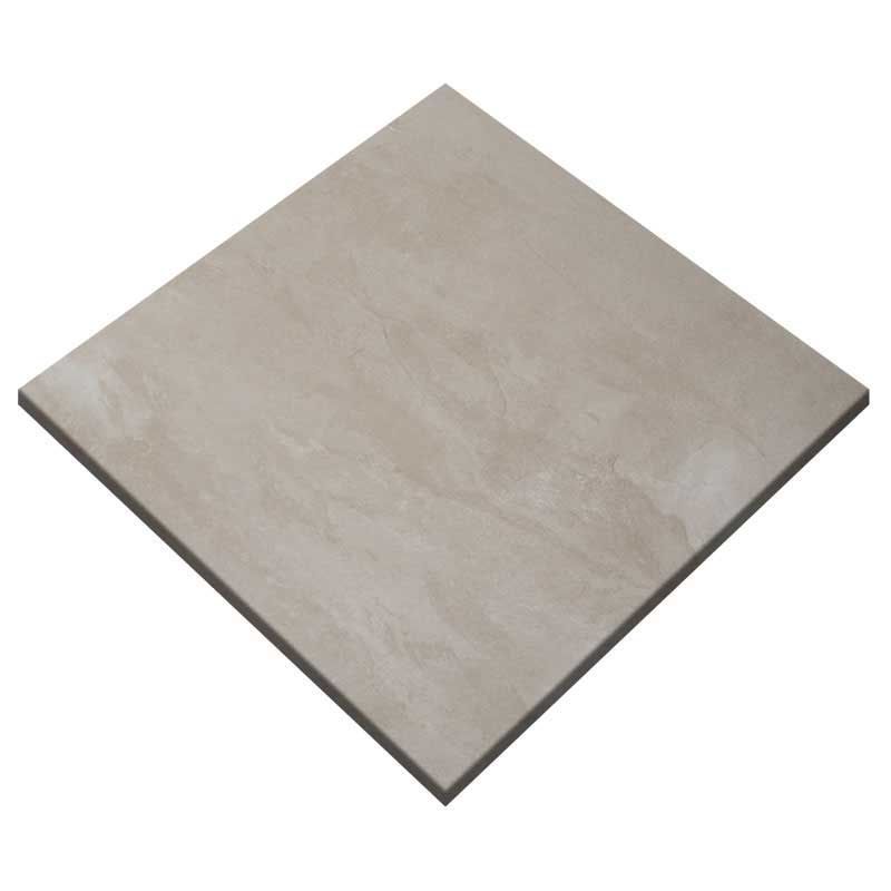 A square tile is sitting on a white surface