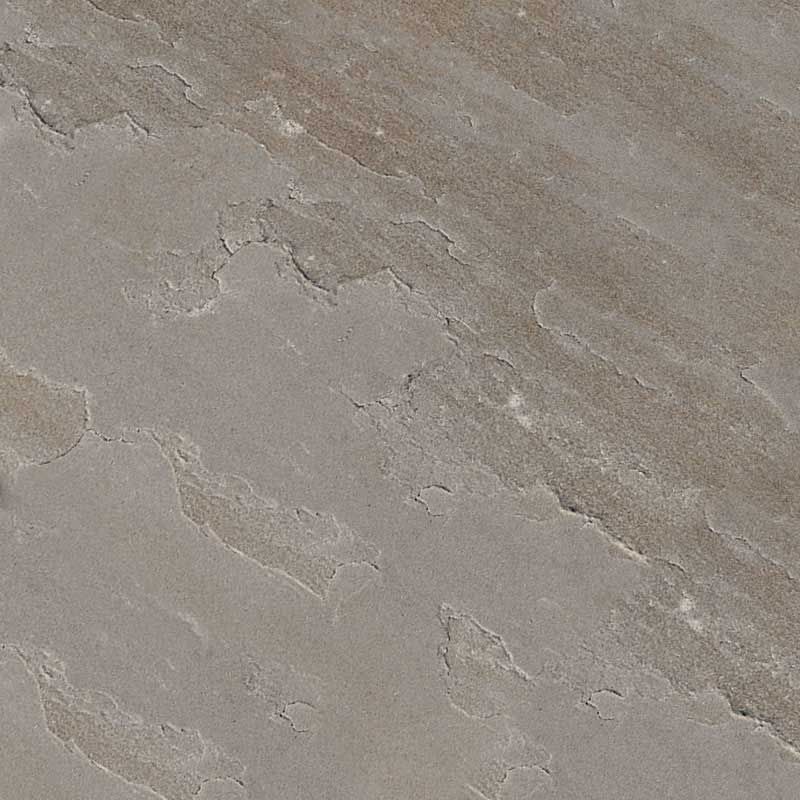A close up of a gray stone surface