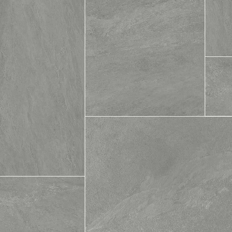 A close up of a gray tile floor.