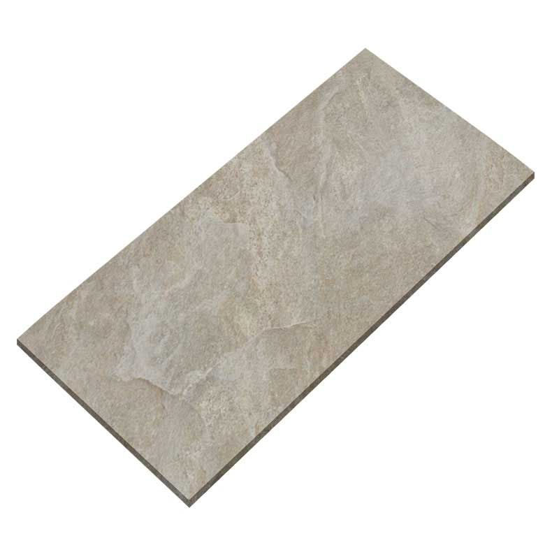 A gray tile is laying on a white surface