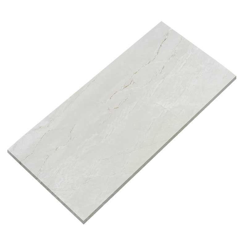 A white tile is laying on a white surface.