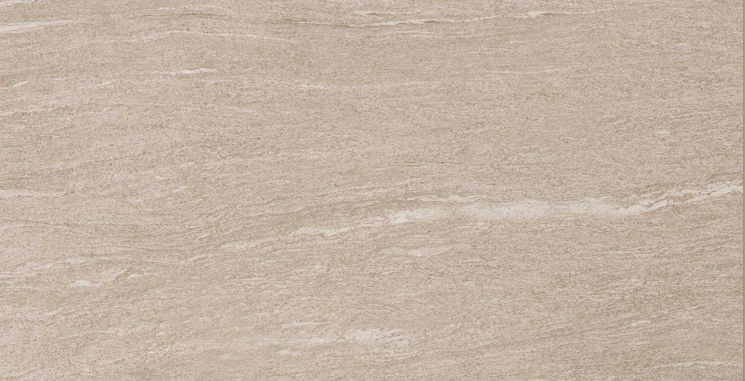 A close up of a beige tile with a grainy texture.