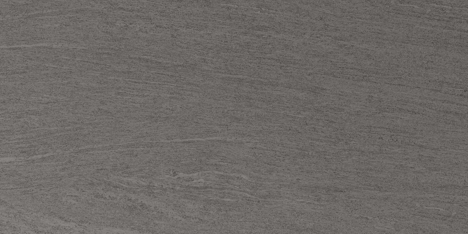 A close up of a gray carpet texture.