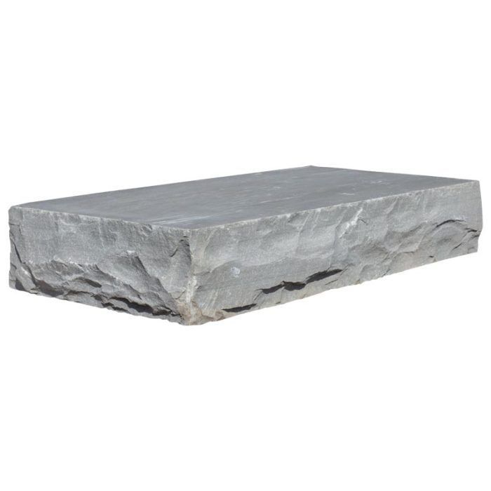 A gray stone block on a white background.