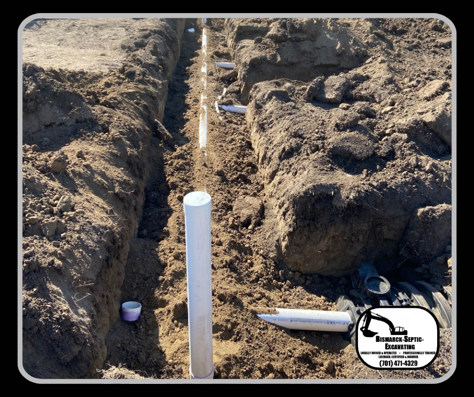 A drain pipe is being installed in the dirt.
