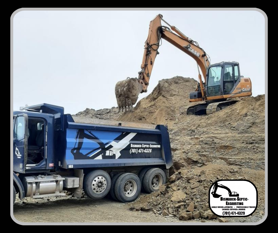 An excavator is loading dirt into a dump truck.