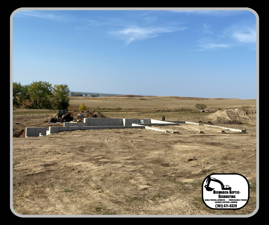 A picture of a construction site with a bulldozer in the background.