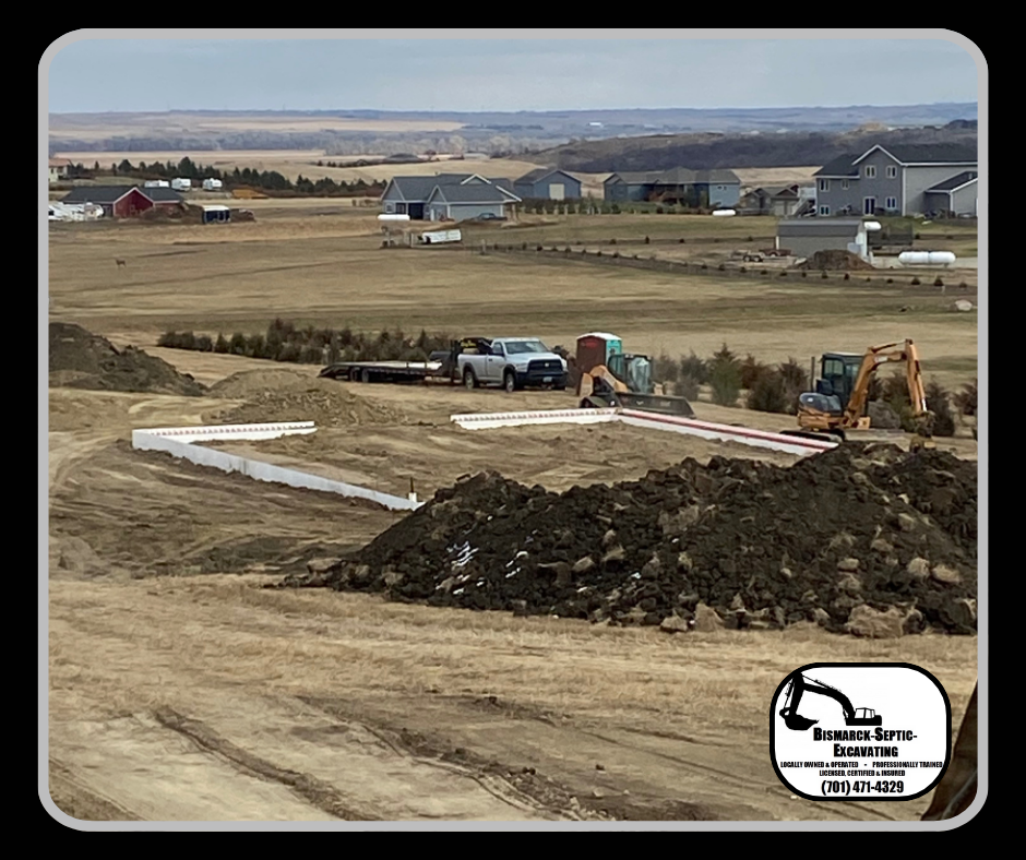A large pile of dirt is sitting on top of a dirt field.