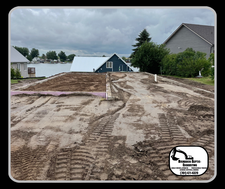 A picture of a dirt road with a house in the background.