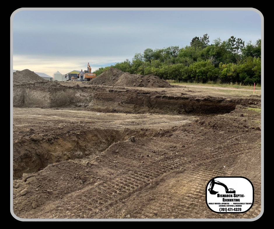 A large pile of dirt is sitting on top of a dirt field.