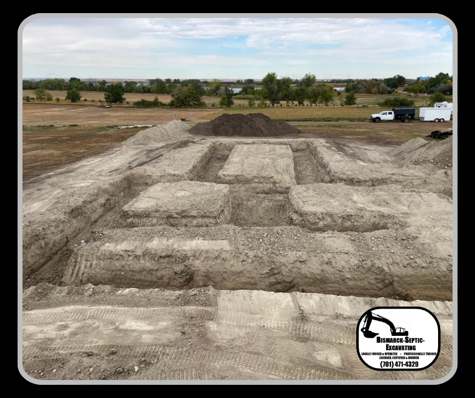 A large pile of dirt is sitting on top of a dirt field.