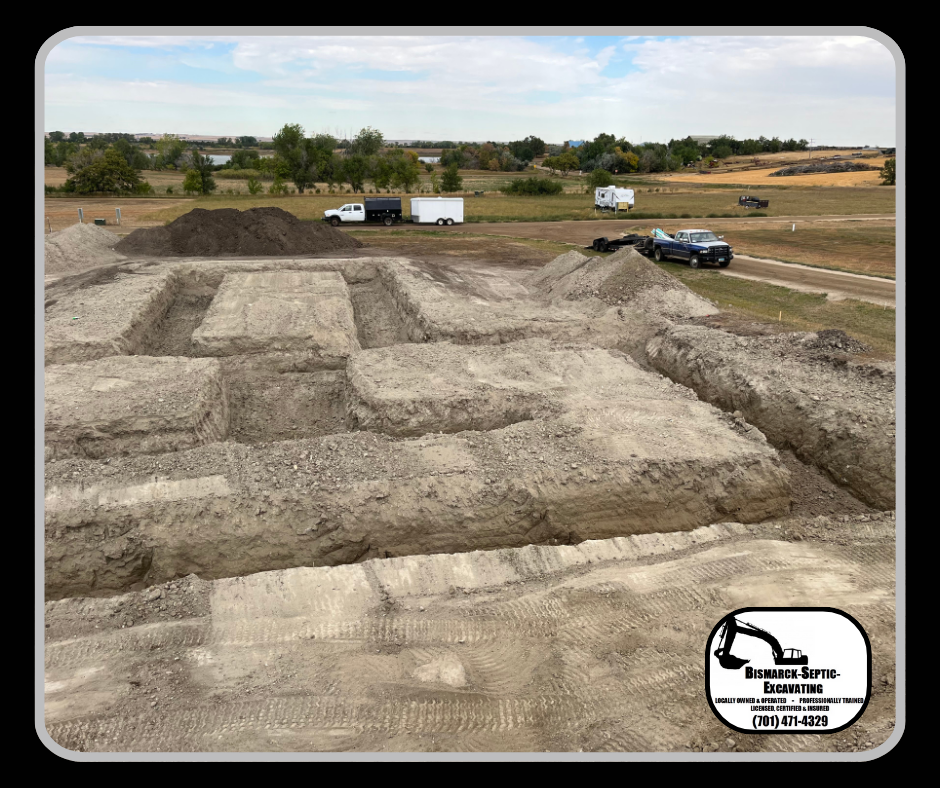 A large pile of dirt is sitting on top of a dirt field.
