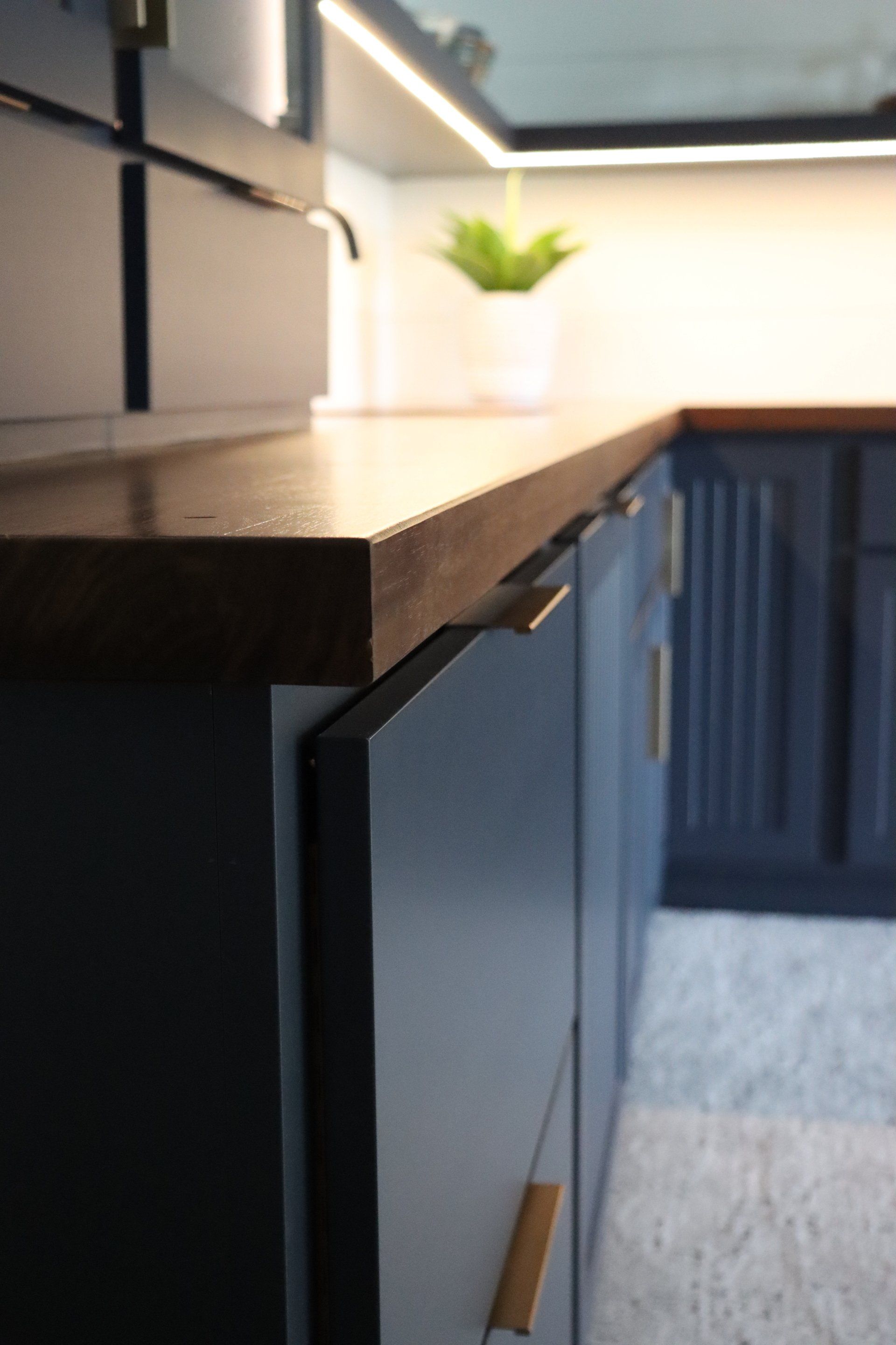 Wood Countertop with Black Cabinet