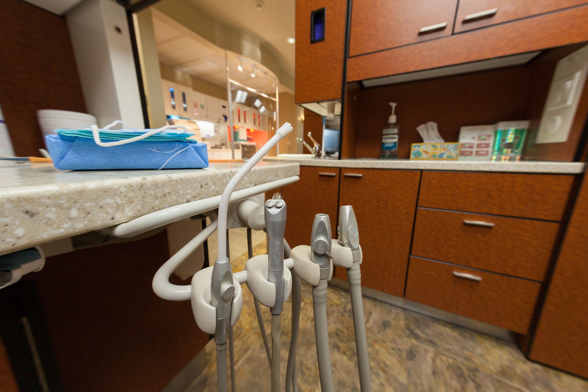A dental office with a dental chair and dental equipment.