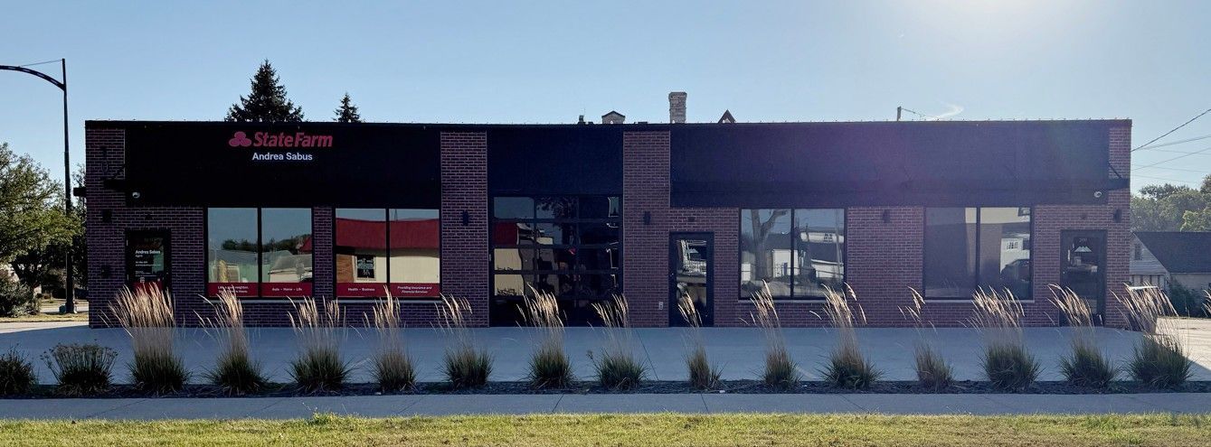 Building with brick accents and large windows