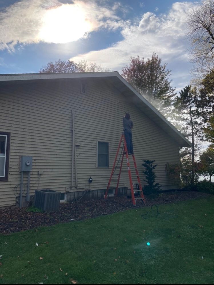 Power washing siding after