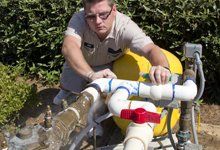 Plumber checking the backflow