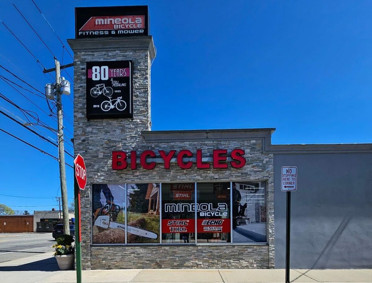A bicycle shop is located on the side of the road